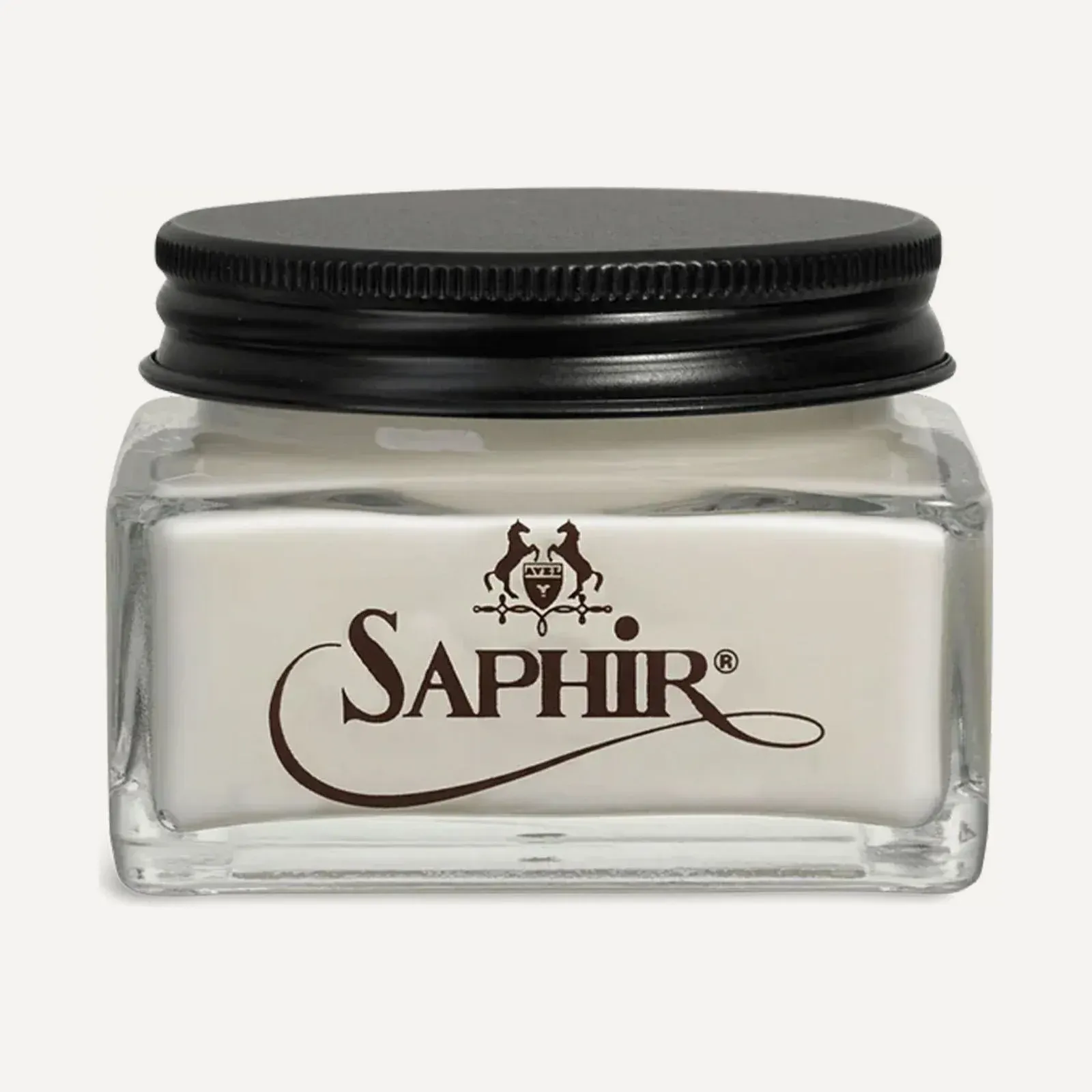 Saphir Renovateur 50 ml — kremowa odżywka do skóry w przezroczystym słoiku z czarną zakrętką.