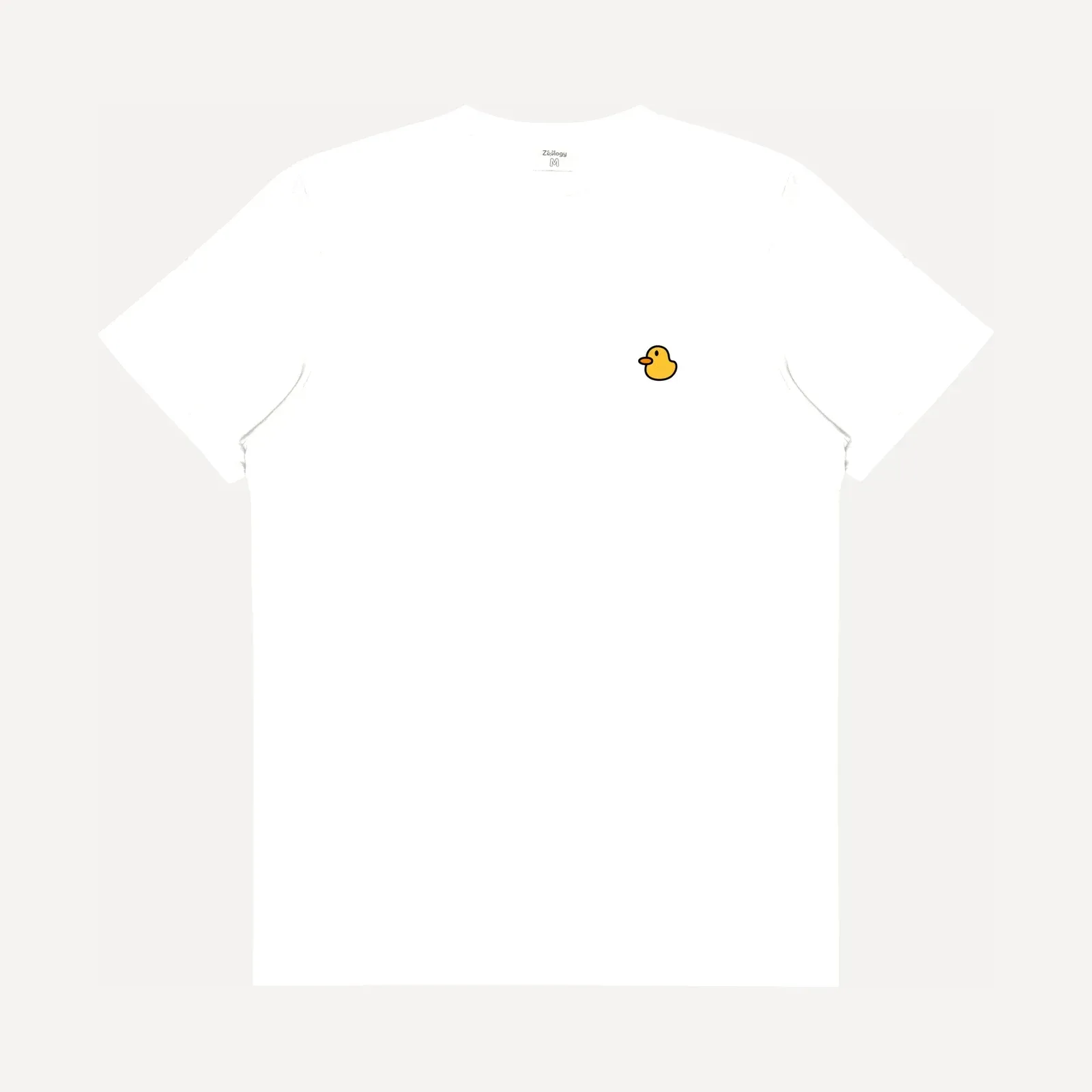Biały t-shirt Zoology z krótkim rękawem i okrągłym dekoltem, z małą haftowaną złotą kaczuszką na lewej piersi, ujęcie produktowe.